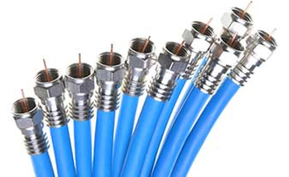Close-up of blue coaxial cables bundled together, each with a silver connector at the end.