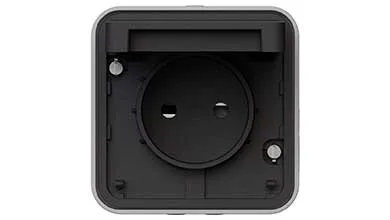Square electrical outlet with a silver frame, black interior, and an open hinged cover at the top.